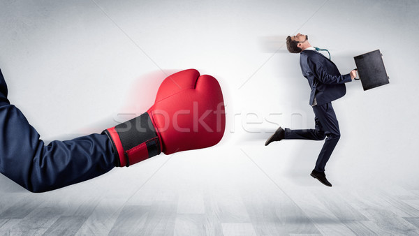 Czerwony rękawica bokserska na zewnątrz mały biznesmen duży Zdjęcia stock © ra2studio