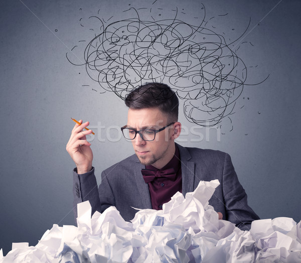 Businessman above crumpled paper Stock photo © ra2studio