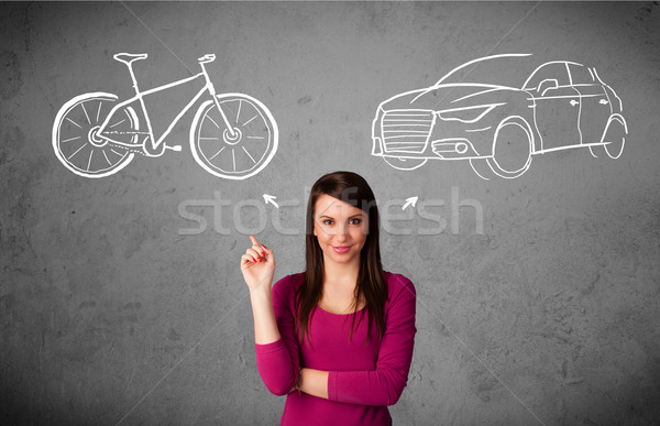 Woman making a choice between bicycle and car Stock photo © ra2studio