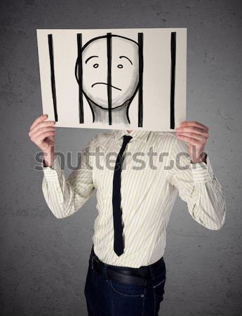 üzletember tart papír fogoly mögött rácsok Stock fotó © ra2studio