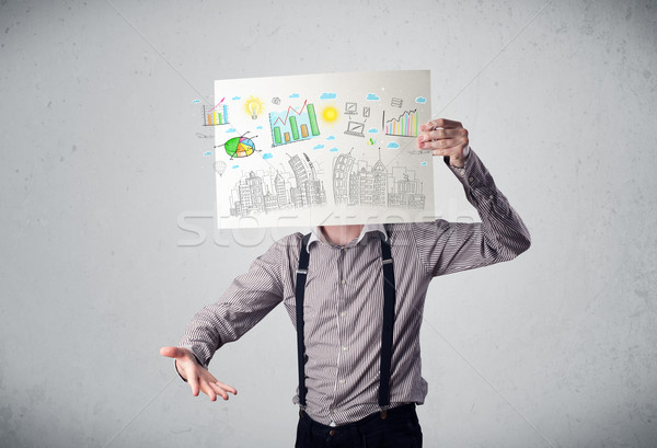 Businessman holding a paper with charts and cityscape in front o Stock photo © ra2studio