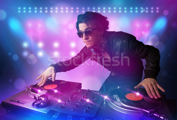 Disc jockey música tocadiscos etapa luces jóvenes Foto stock © ra2studio