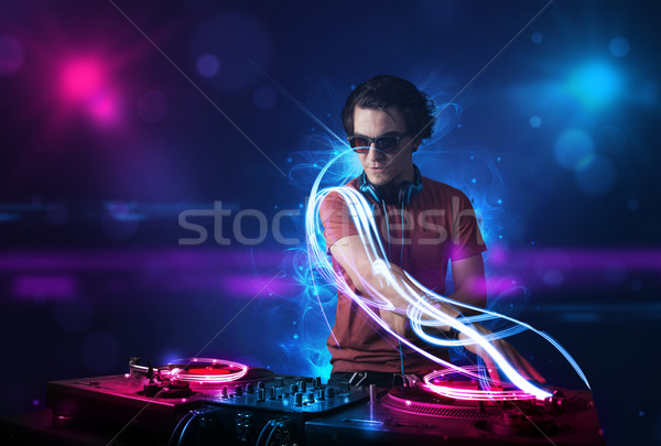 [[stock_photo]]: Disc-jockey · jouer · musique · effets · de · lumière · lumières · jeunes