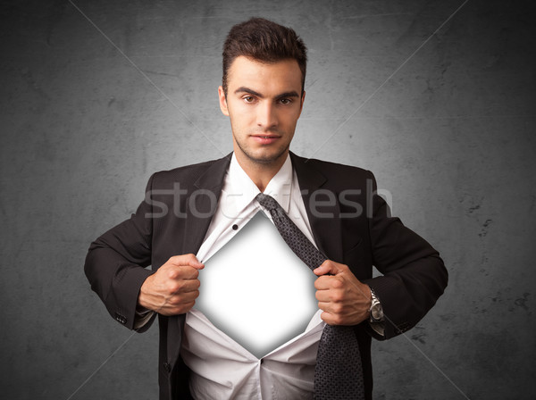 Businessman tearing off his shirt with white copyspace on chest Stock photo © ra2studio