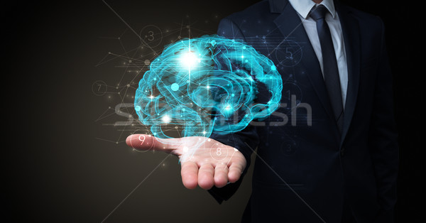 Om creierul uman mână om de afaceri logistica Imagine de stoc © ra2studio
