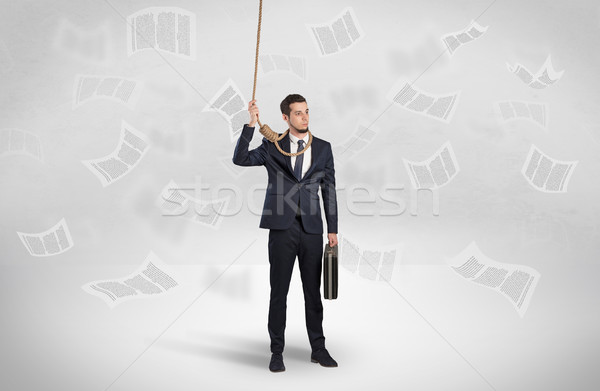 Burnout businessman with flying documents concept Stock photo © ra2studio