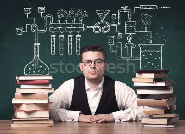 Teacher at chemistry class Stock photo © ra2studio