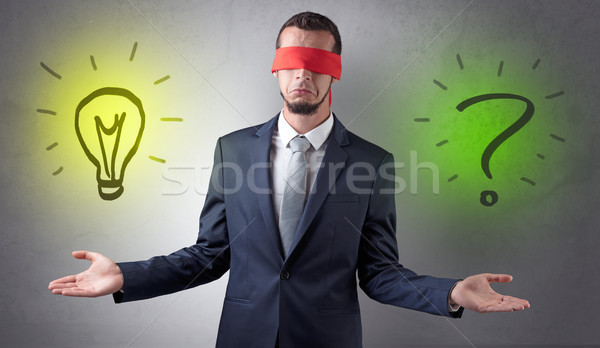 Businessman with idea versus question concept Stock photo © ra2studio