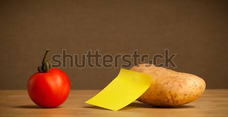 Potato with post-it note looking at tomato Stock photo © ra2studio