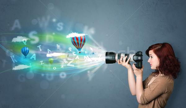 Stock photo: Photographer with camera and abstract imaginary