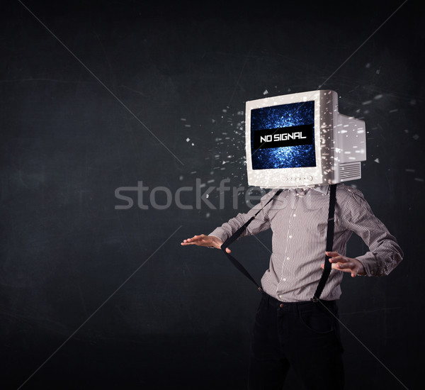 Man with a monitor head, no signal sign on the display Stock photo © ra2studio