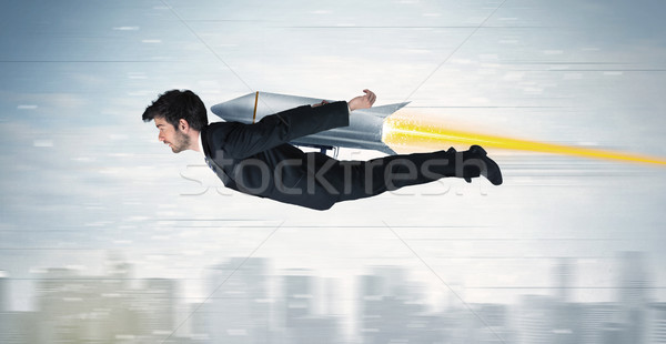 Szuperhős üzletember repülés repülőgép csomag rakéta Stock fotó © ra2studio