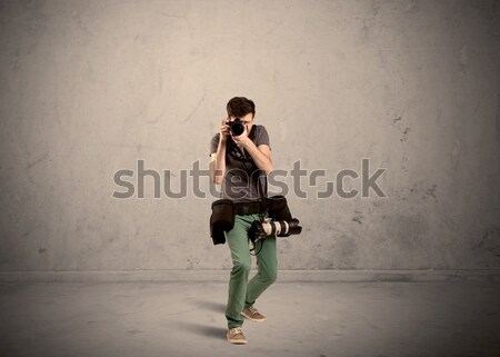 Hobby photographer holding camera Stock photo © ra2studio