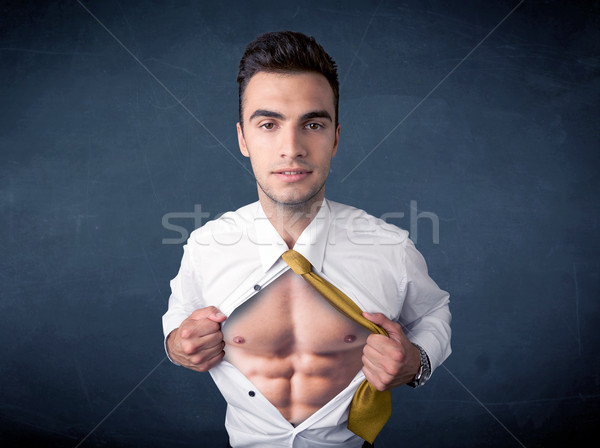 Businessman tearing off shirt and showing mucular body Stock photo © ra2studio