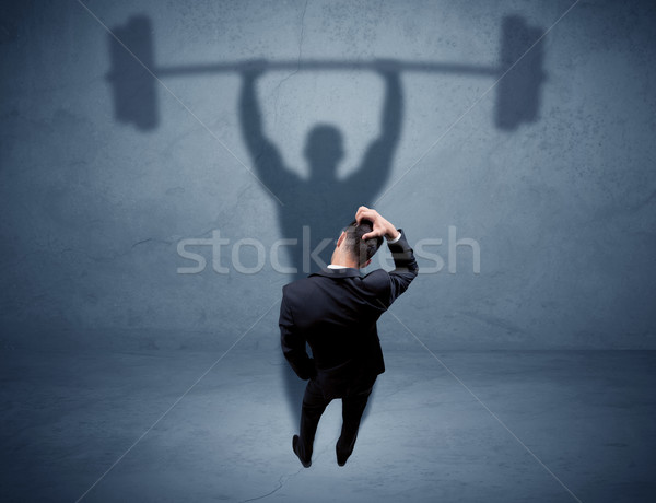 Geschäftsmann Gewichtheben Schatten jungen eleganten Verkäufer Stock foto © ra2studio
