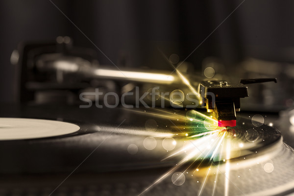 Zenelejátszó játszik bakelit izzik vonalak szükség Stock fotó © ra2studio