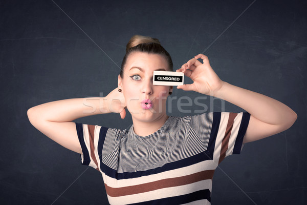 Pretty girl with censored paper sign Stock photo © ra2studio