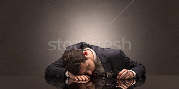 Businessman fell asleep at his workplace Stock photo © ra2studio