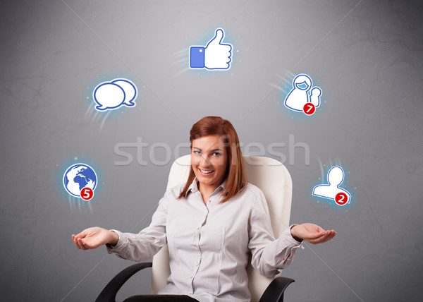 attractive young woman juggling with social network icons Stock photo © ra2studio