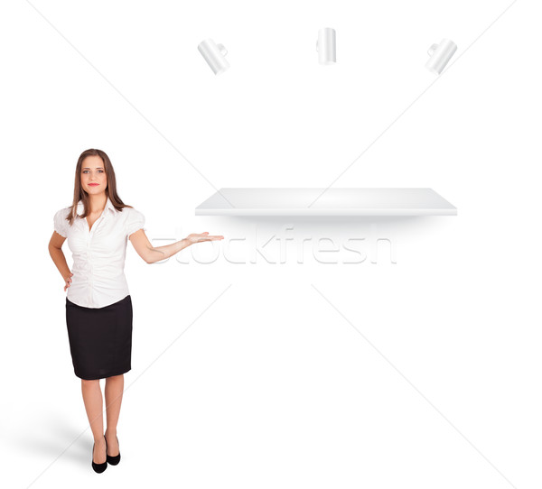 Beutiful young woman presenting modern copy space Stock photo © ra2studio