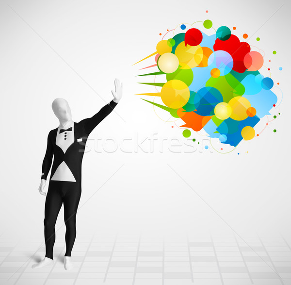 Strange guy in morphsuit looking at colorful speech bubbles Stock photo © ra2studio