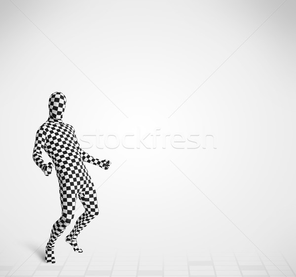 Stock photo: Funny guy in morphsuit body suit looking at copy space