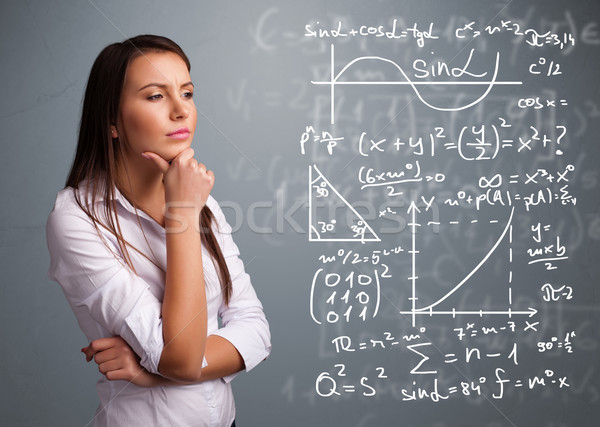 Piękna uczennica myślenia kompleks matematyczny znaki Zdjęcia stock © ra2studio