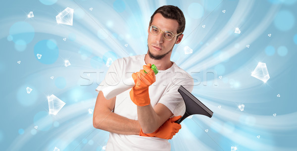 Blue diamond graphic and cleaning boy Stock photo © ra2studio