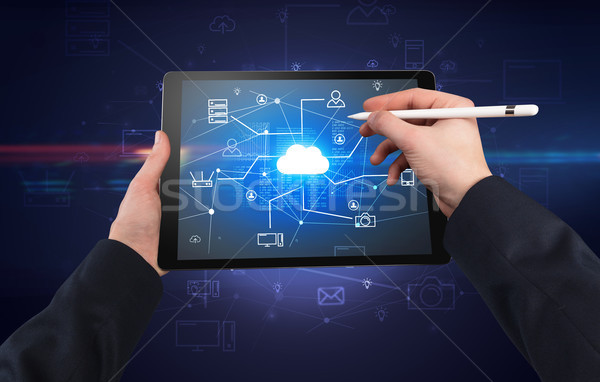 First person view of tablet with cloud office concept Stock photo © ra2studio