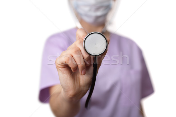 Female doctor holding stethoscope pointed toward camera 3 Stock photo © ra2studio