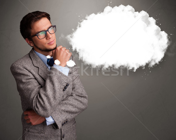 Good-looking young man thinking about cloud speech or thought bubble Stock photo © ra2studio