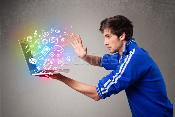 Junger Mann halten Laptop farbenreich Hand gezeichnet Stock foto © ra2studio