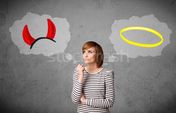 Woman choosing between good and bad Stock photo © ra2studio