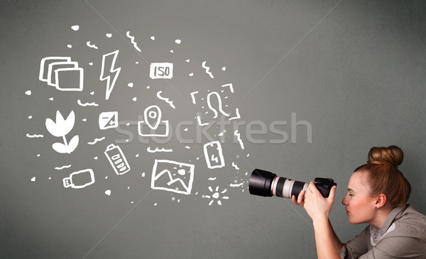 Photographer girl capturing white photography icons and symbols Stock photo © ra2studio