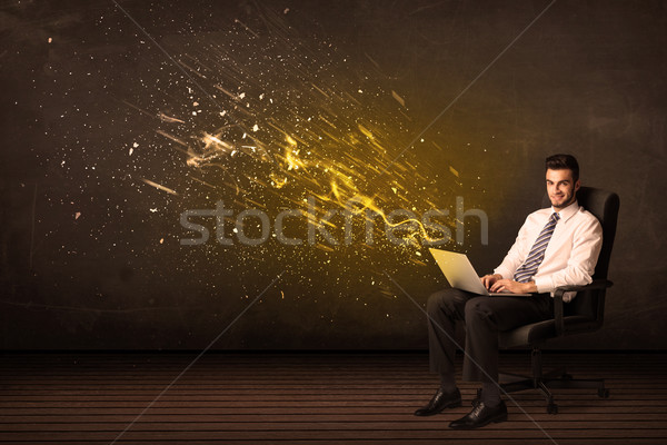 üzletember laptop energia robbanás üzlet iroda Stock fotó © ra2studio