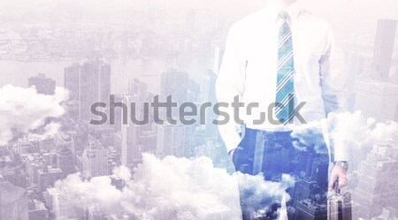 Homme d'affaires permanent ville homme fond [[stock_photo]] © ra2studio