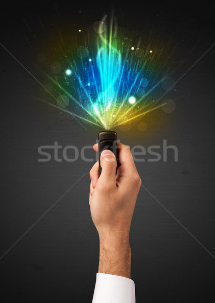 Kéz távirányító robbanékony jel tart ragyogó Stock fotó © ra2studio