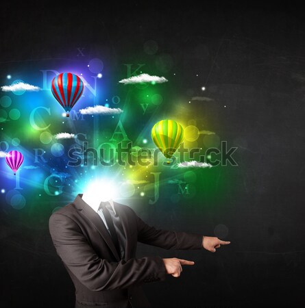 Stock photo: Man in suit with dreamy cloudscape concept