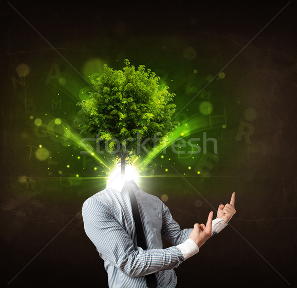 Man with green tree head concept Stock photo © ra2studio