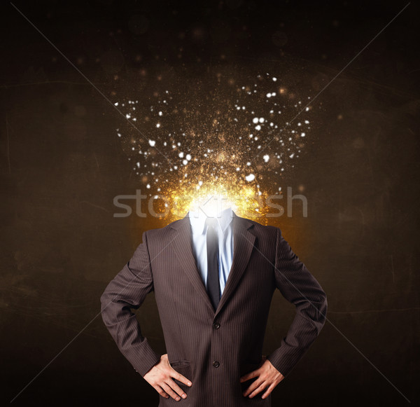 Business man with glowing exploding head Stock photo © ra2studio