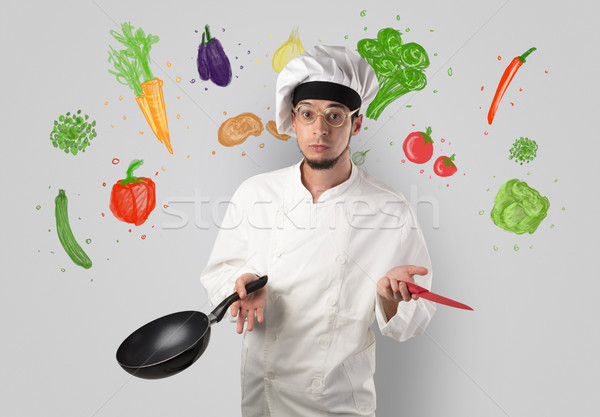 Cook with colourful drawn vegetables Stock photo © ra2studio