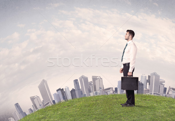 Férfi áll város tájkép sikeres férfi Stock fotó © ra2studio