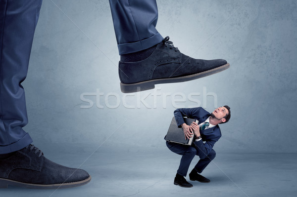 Stock photo: Trampled small businessman in suit