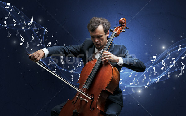 Samotny kompozytor gry wiolonczela musical Zdjęcia stock © ra2studio