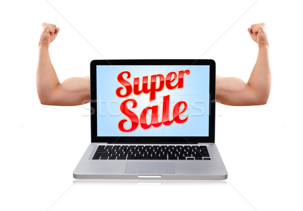 Laptop with super sale sign and muscular biceps Stock photo © ra2studio