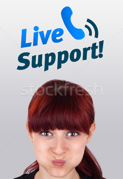 Young girl looking at support contact type of icons and signs Stock photo © ra2studio