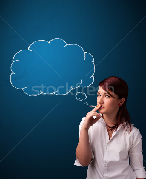 Stock photo: Beautiful lady smoking cigarette with idea cloud