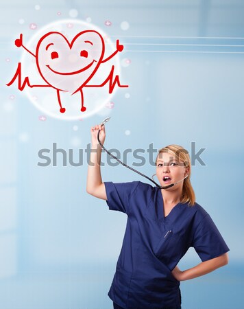 Stock photo: Pretty medical doktor listening to red pulse and heart rates