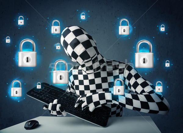 Hacker in disguise with virtual lock symbols and icons Stock photo © ra2studio