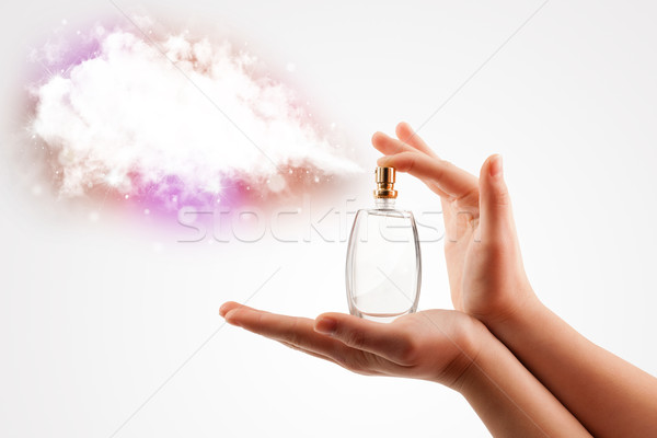 woman hands spraying colorful cloud Stock photo © ra2studio